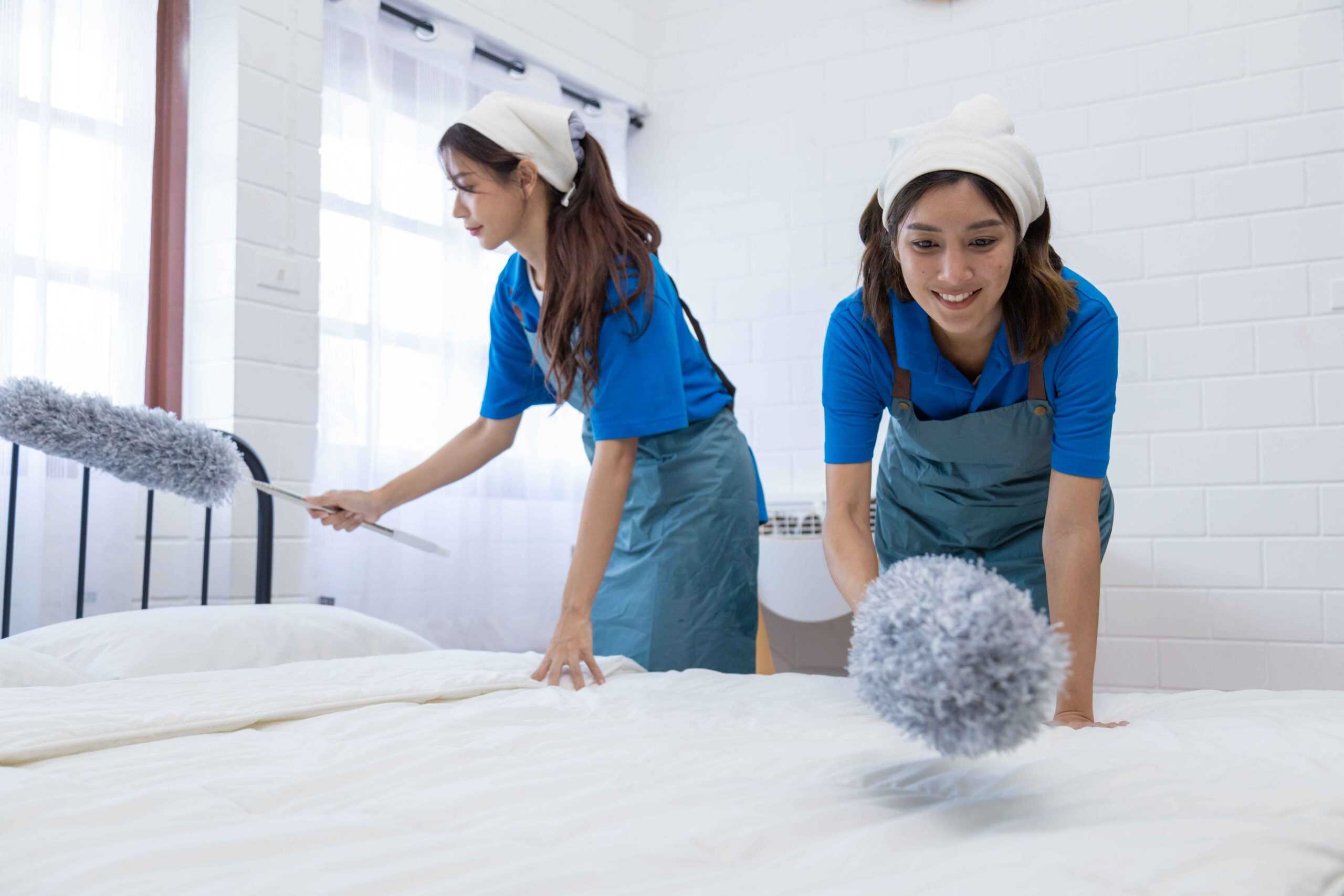 two-young-professional-housewives-cleaning-the-hou-2023-11-27-04-54-46-utc (1) Bedroom Cleaning Service